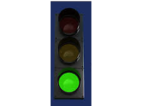 The signal is pedestrian-activated; drivers may proceed but must yield to pedestrians who have activated the signal — Alberta traffic-signals road sign for Class 7 test