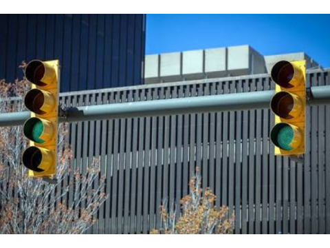 You have a protected advance — you may proceed including turning left — Alberta traffic-signals road sign for Class 7 test