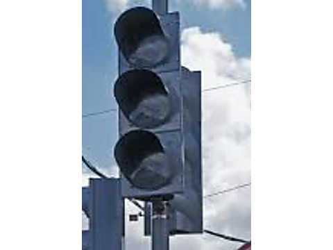 Stop completely, then proceed when safe — treat it as a four-way stop — Alberta traffic-signals road sign for Class 7 test