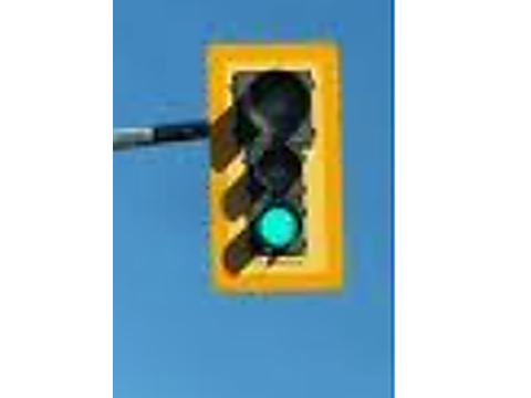 Stop before entering the intersection and wait until traffic clears — Alberta right-of-way road sign for Class 7 test