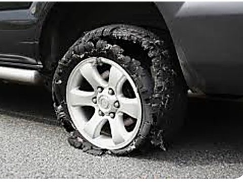 Take your foot off the accelerator and steer firmly in the direction you want to go — Alberta other road sign for Class 7 test