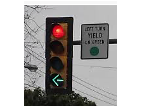 Cannot cross the path of an approaching vehicle unless it is safe to do so — Alberta traffic-signals road sign for Class 7 test